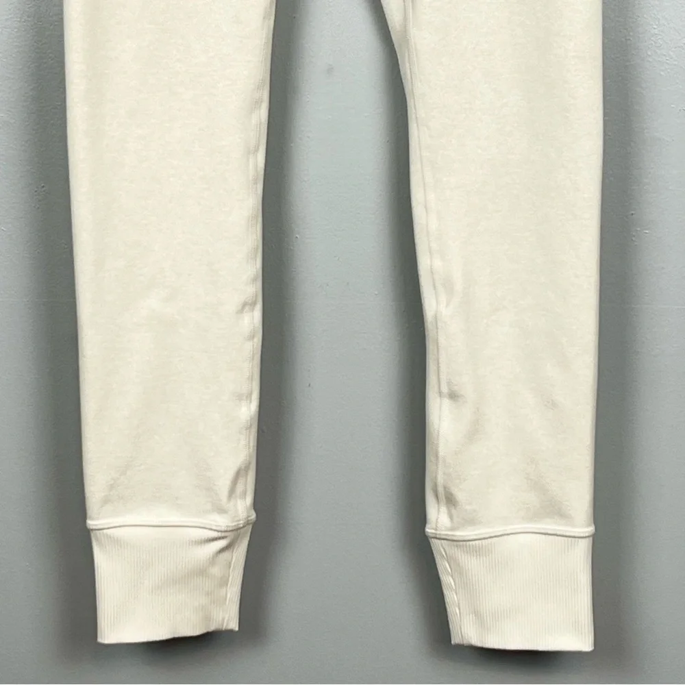 Athleta ivory oatmeal color Softluxe Cuffed Tight, size small.